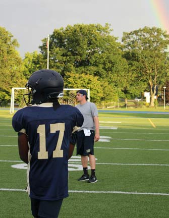 teen-playing-football